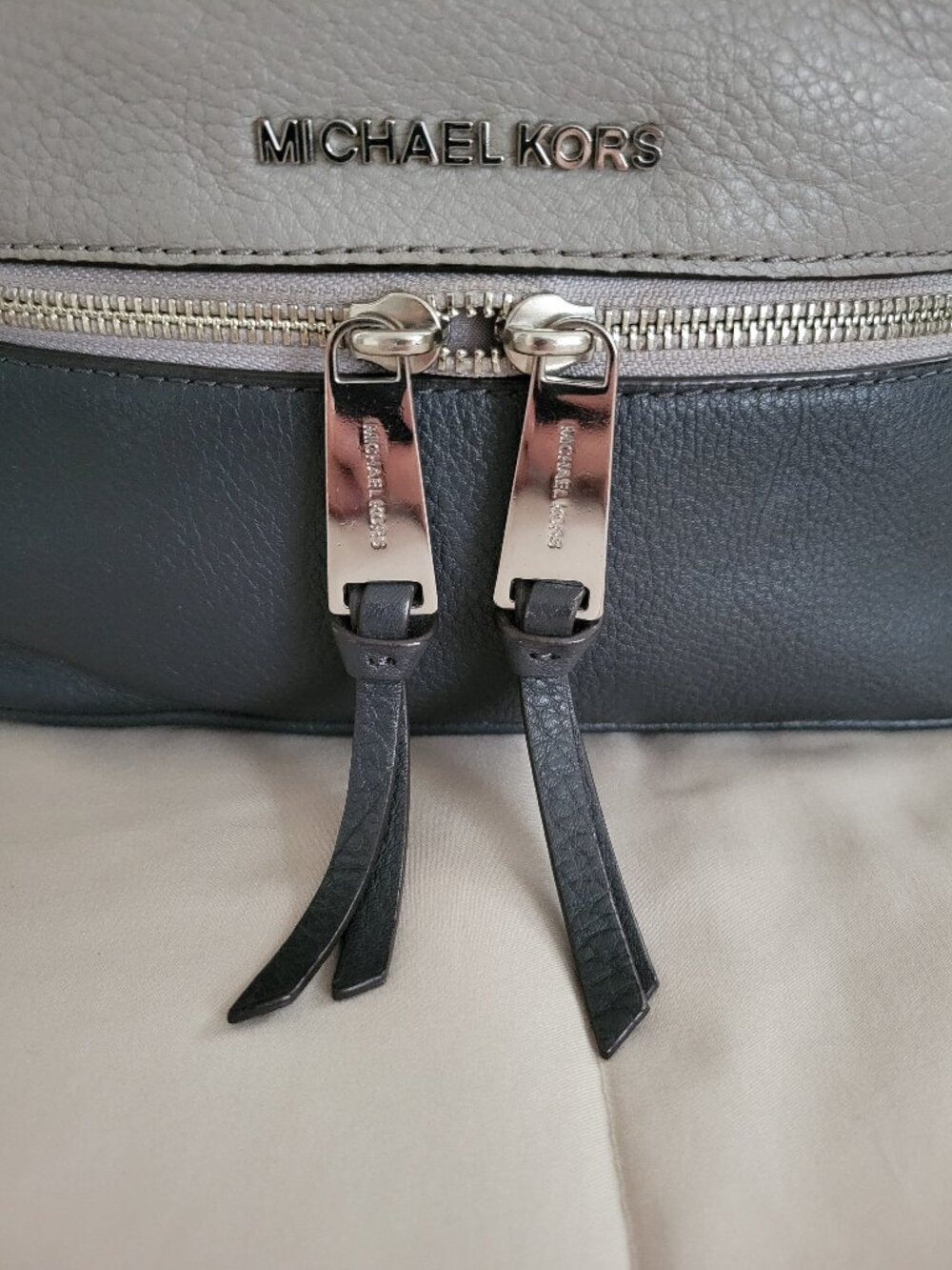 Michael Kors RHEA backpack. Gray color. Preowned.